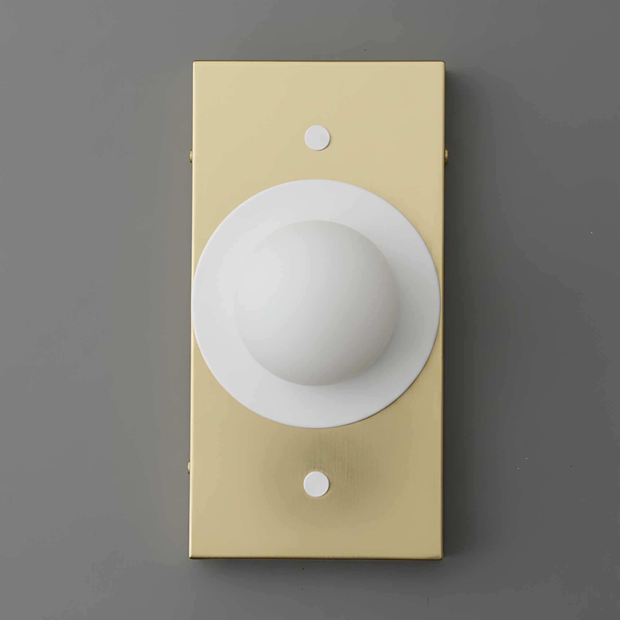 Antique brass rectangular wall sconce with a cream minimalist globe shade and two small circular accents on top and bottom. - SCONCE MODEL NO. 4474