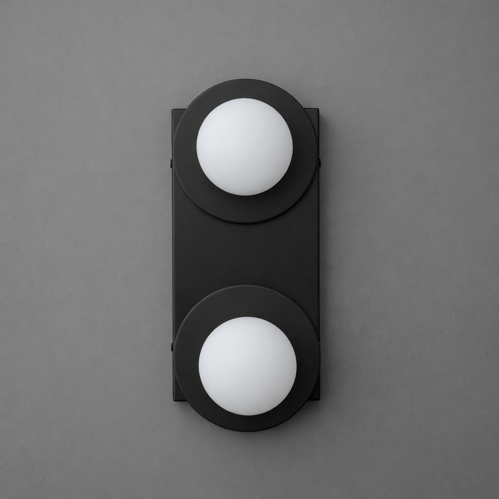 Two-light sconce in Black with round plates and opal glass globes on a tall rectangular backplate. - SCONCE MODEL NO. 8828