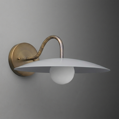 Wall-mounted brass sconce with curved arm and wide, flat white shade over a round frosted bulb. - SCONCE MODEL NO. 2162