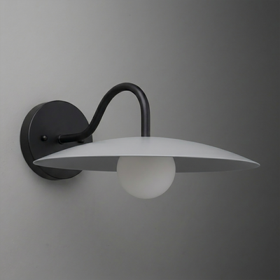 Wall-mounted sconce with matte black curved arm and round base, featuring a flat, wide white shade and a frosted globe bulb. - SCONCE MODEL NO. 2162
