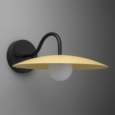 Black metal wall sconce with curved arm and wide flat yellow shade over round white bulb. - SCONCE MODEL NO. 2162
