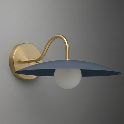 Wall-mounted sconce with matte gold curved arm, round base, and flat navy blue shade over white bulb. - SCONCE MODEL NO. 2162