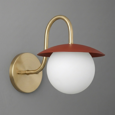 Wall sconce with brushed brass arm and base, white glass globe shade, terracotta red top cover. - SCONCE MODEL NO. 2206