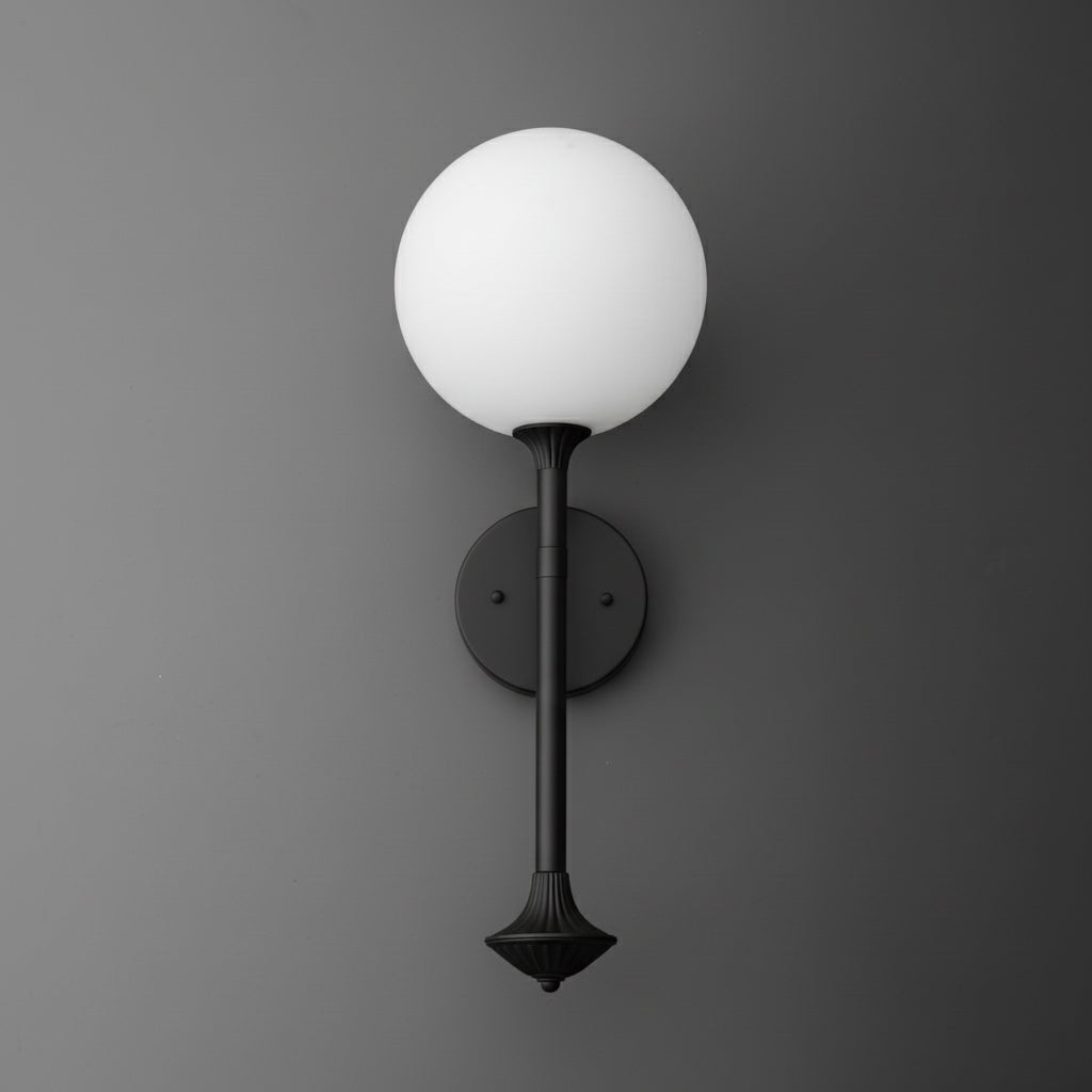 Black metal wall sconce with a vertical rod supporting a large white frosted glass globe shade. - SCONCE MODEL NO. 1059
