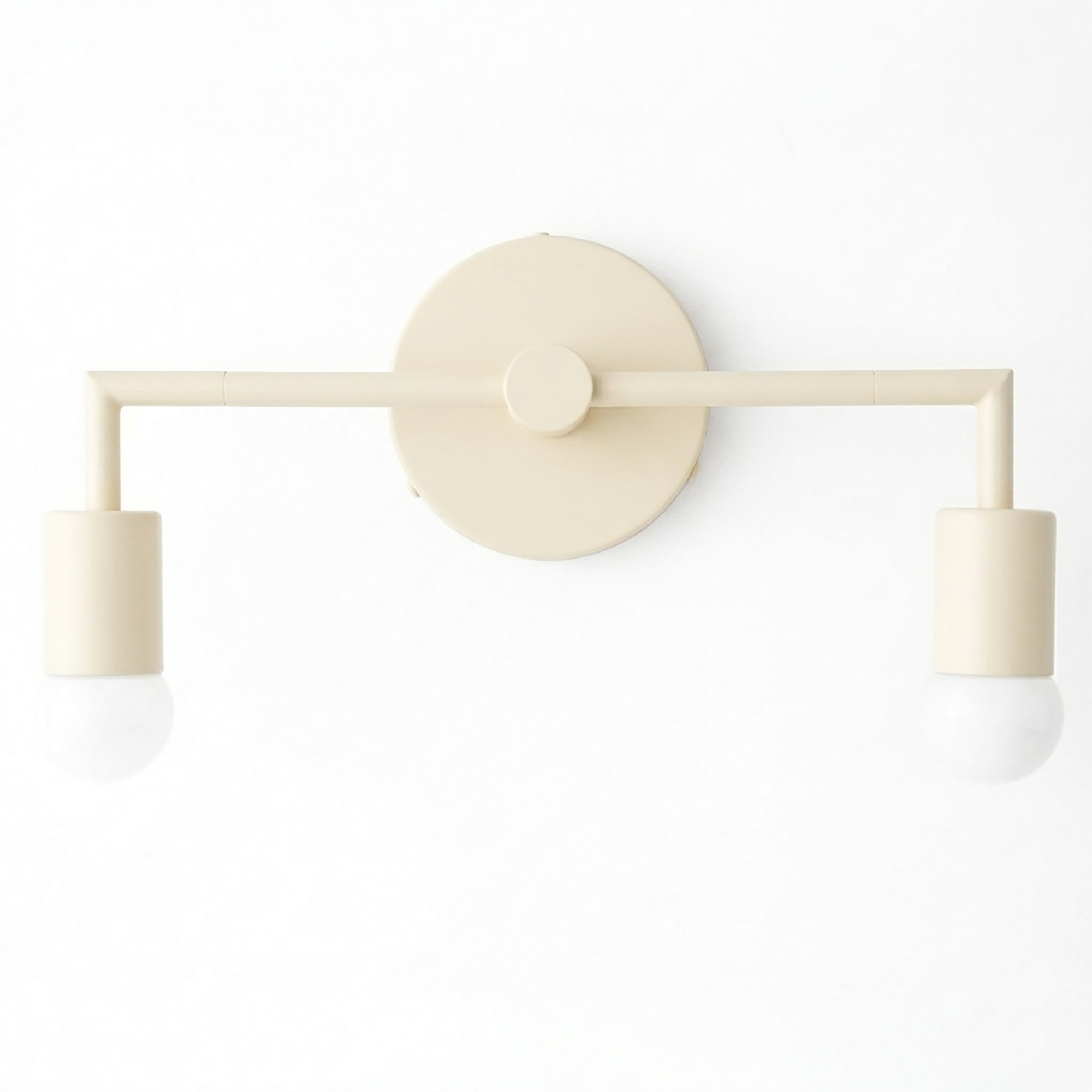 Matte beige Scandinavian-style vanity light with two exposed bulbs and cylindrical holders. - VANITY LIGHT MODEL NO. 1561