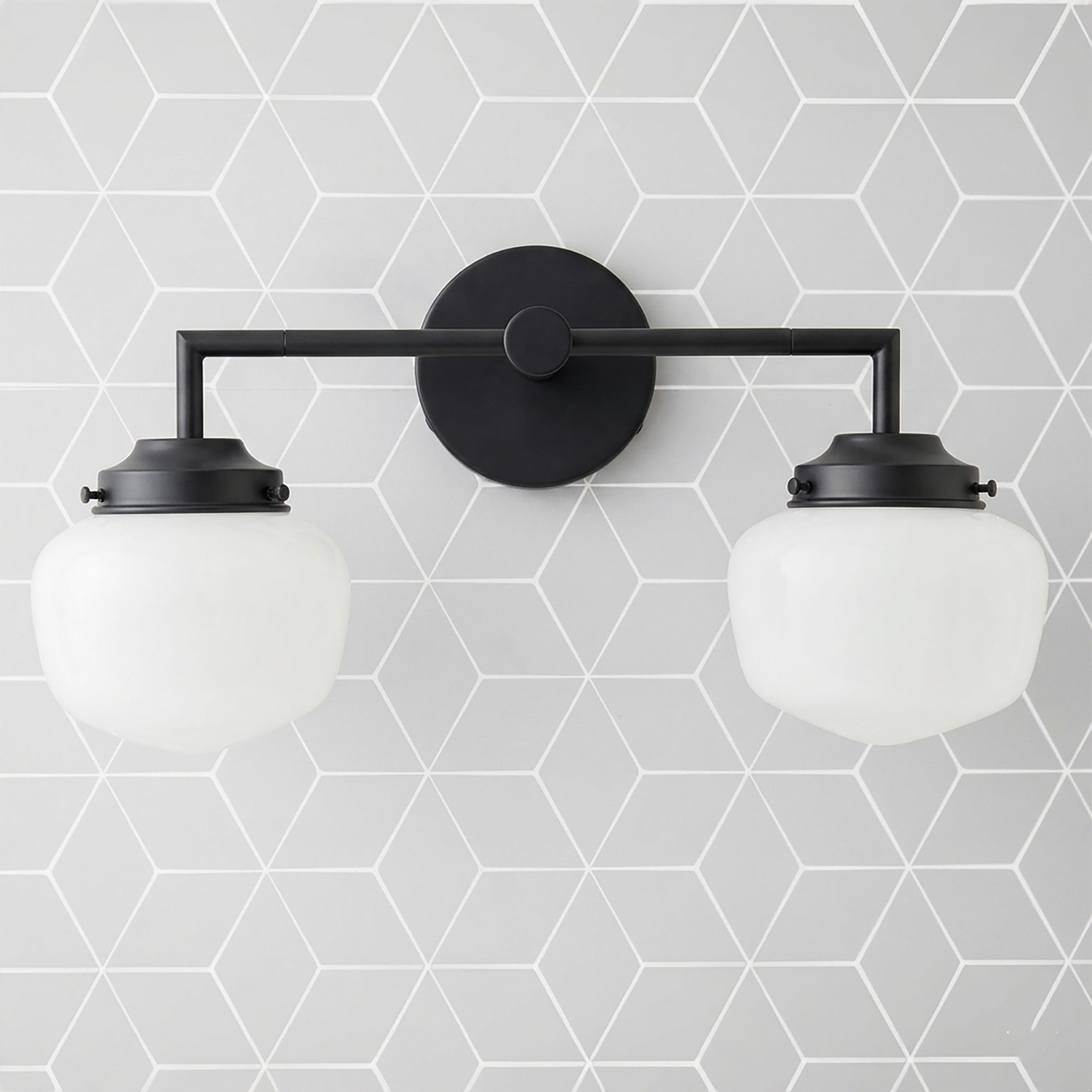 Two-bulb black metal vanity light with round frosted white glass globes and minimalist geometric design. - VANITY LIGHT MODEL NO. 0276
