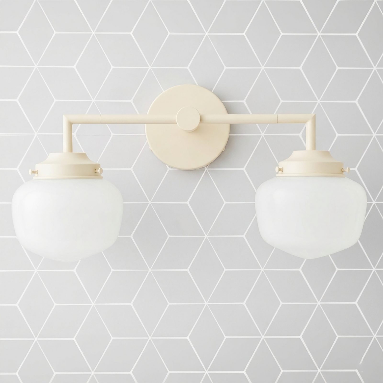 Matte cream-colored metal vanity light with two round white glass globes on straight horizontal bar. - VANITY LIGHT MODEL NO. 0276