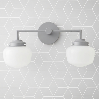 Two-bulb vanity light with matte gray metal frame and round white glass globe shades. - VANITY LIGHT MODEL NO. 0276