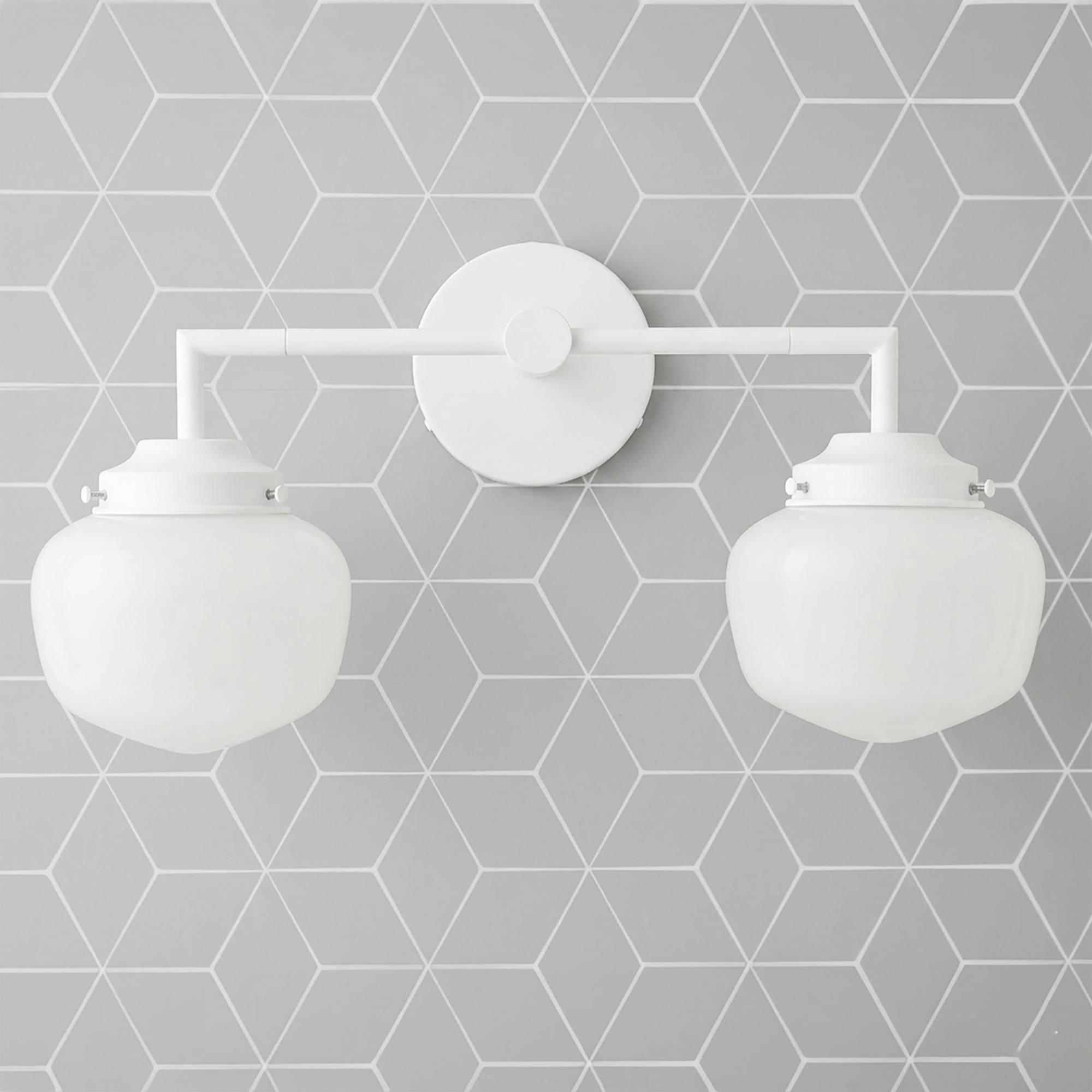 White metal vanity light with two round opaque glass globes and a central circular wall mount. - VANITY LIGHT MODEL NO. 0276