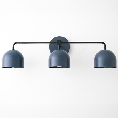 Mid-century modern 3-bulb vanity light with matte black frame and deep coal blue dome shades. - VANITY LIGHT MODEL NO. 7456