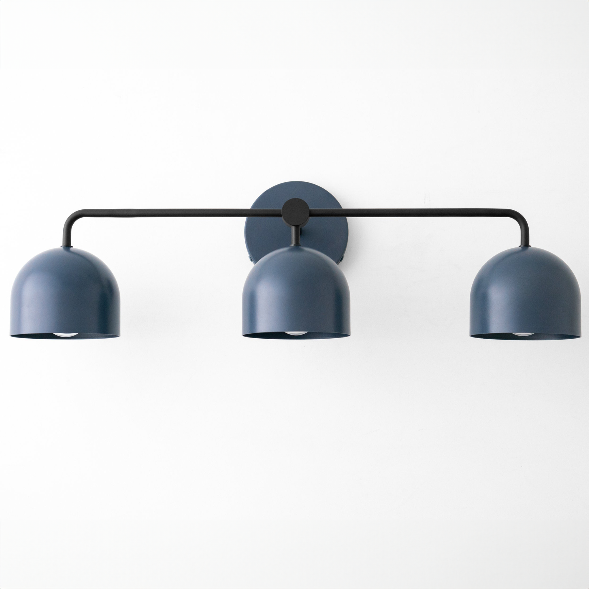 Matte deep blue three-bulb vanity light with dome-shaped metal shades and black horizontal arm. - VANITY LIGHT MODEL NO. 7456