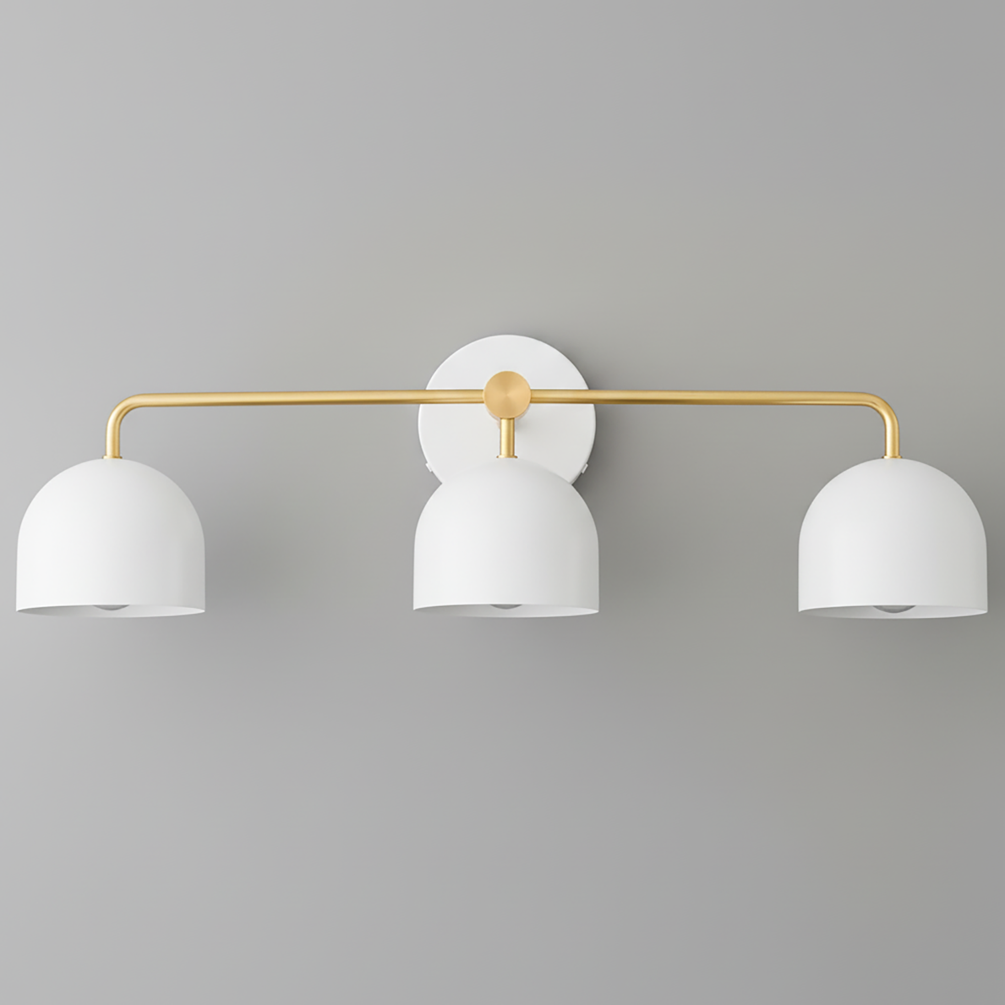 Mid-century modern vanity light with three white bell-shaped shades and a raw brass horizontal bar mounted on a white. - VANITY LIGHT MODEL NO. 7456