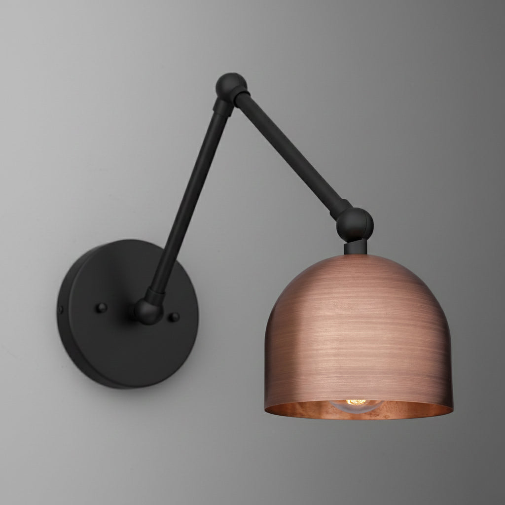 Wall-mounted adjustable sconce with matte black arm and copper dome-shaped shade. - SCONCE MODEL NO. 5997