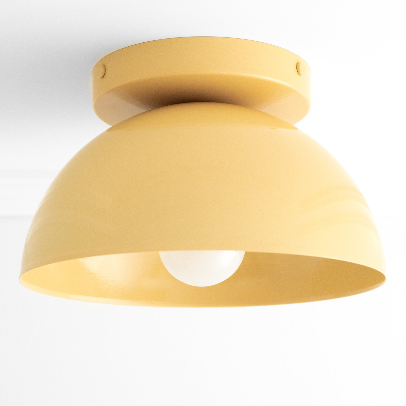 Yellow dome-shaped flush mount ceiling light with smooth matte finish and exposed bulb. - CEILING LIGHT MODEL NO. 9105