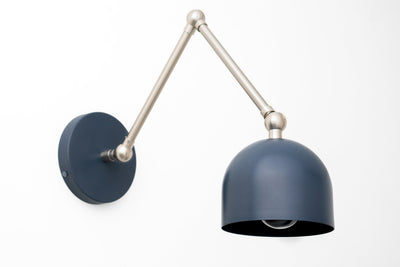 Matte navy blue dome shade on adjustable nickel-plated arm wall sconce with round base. - SCONCE MODEL NO. 5998
