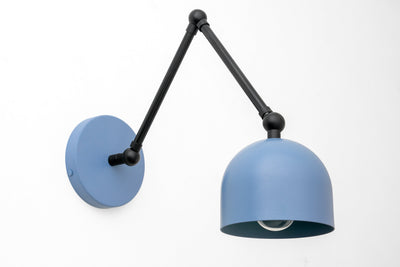 Matte blue dome-shaped metal shade on adjustable black industrial arm wall sconce. - SCONCE MODEL NO. 5998