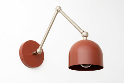 Adjustable industrial wall sconce with matte terracotta dome shade and brushed metal arm. - SCONCE MODEL NO. 5998