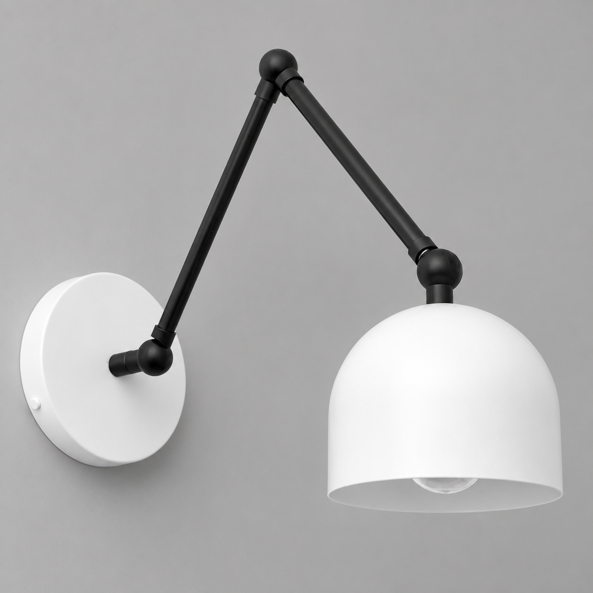 Black adjustable metal arm wall sconce with white dome-shaped shade and round base. - SCONCE MODEL NO. 5998