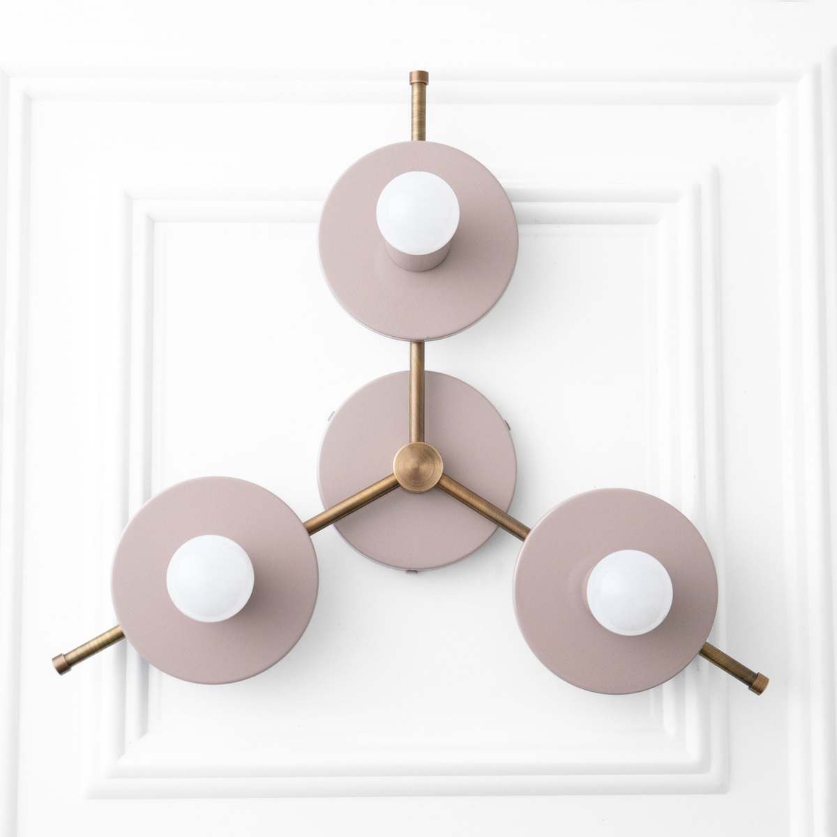 Mid-century modern chandelier with three mauve circular shades and antique brass arms, flush mount ceiling fixture. - CHANDELIER MODEL NO. 9526