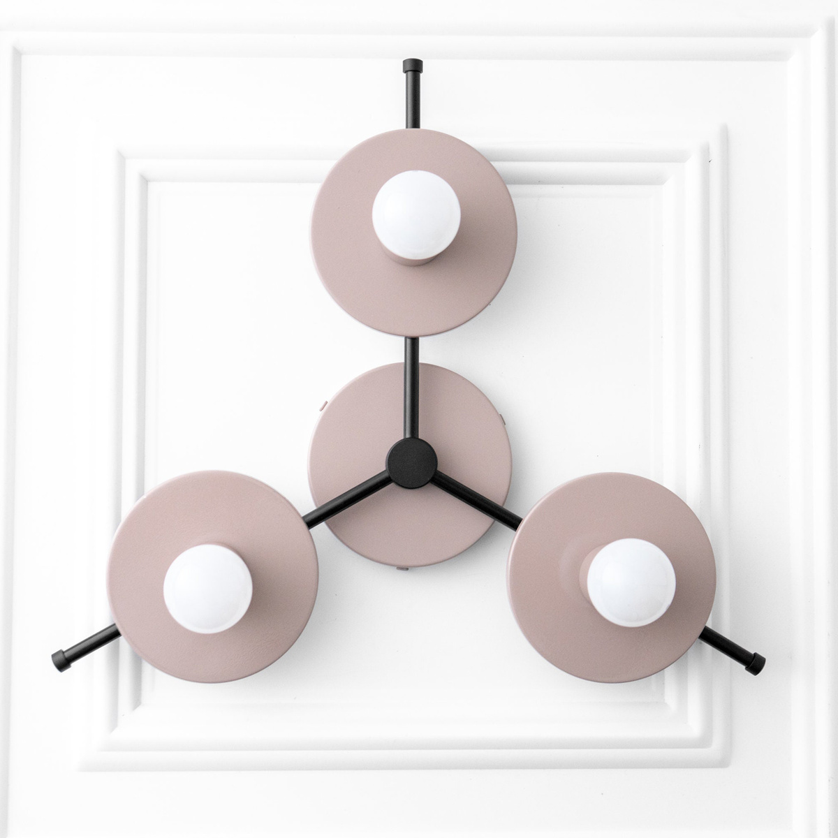 Mid-century modern flush mount chandelier with three mauve metal discs and exposed white bulbs, black frame. - CHANDELIER MODEL NO. 9526