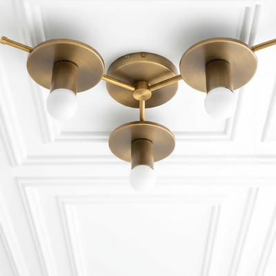 Mid-century modern raw brass flush mount chandelier with three bare bulbs and round bases. - CHANDELIER MODEL NO. 9526