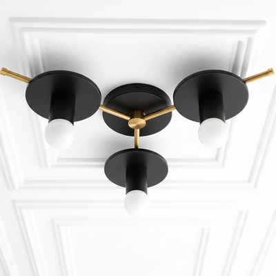 Mid-century modern flush mount chandelier with three exposed white bulbs, black metal shades, and brass accents. - CHANDELIER MODEL NO. 9526