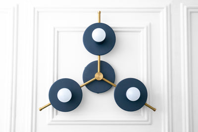 Mid-century modern chandelier with three navy blue circular shades and exposed white bulbs on gold metal arms. - CHANDELIER MODEL NO. 9526