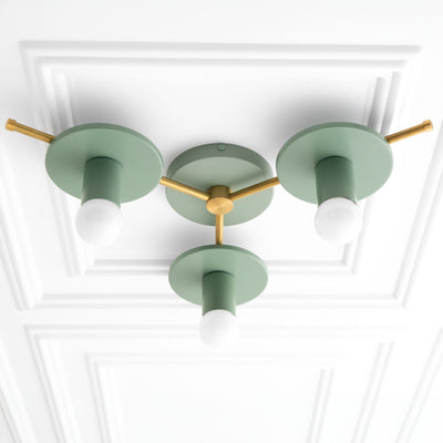 Mid-century modern flush mount chandelier with three matte green round fixtures and antique brass accents. - CHANDELIER MODEL NO. 9526
