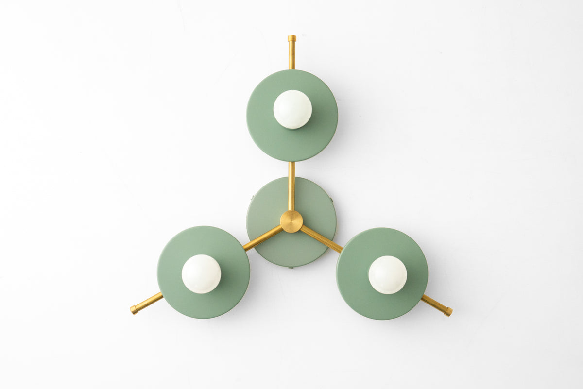 Mid-century modern chandelier with three green circular metal shades and brass arms, flush mount design. - CHANDELIER MODEL NO. 9526