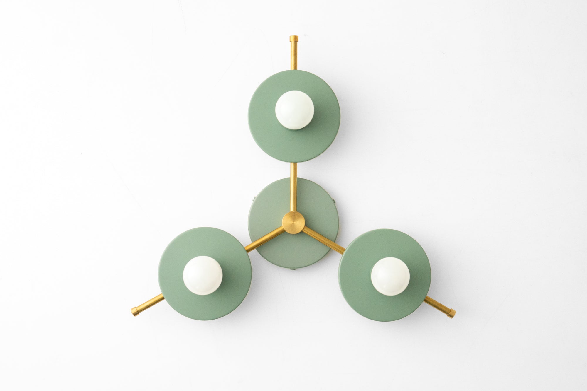 Mid-century modern chandelier with three green circular metal shades and brass arms, flush mount design. - CHANDELIER MODEL NO. 9526