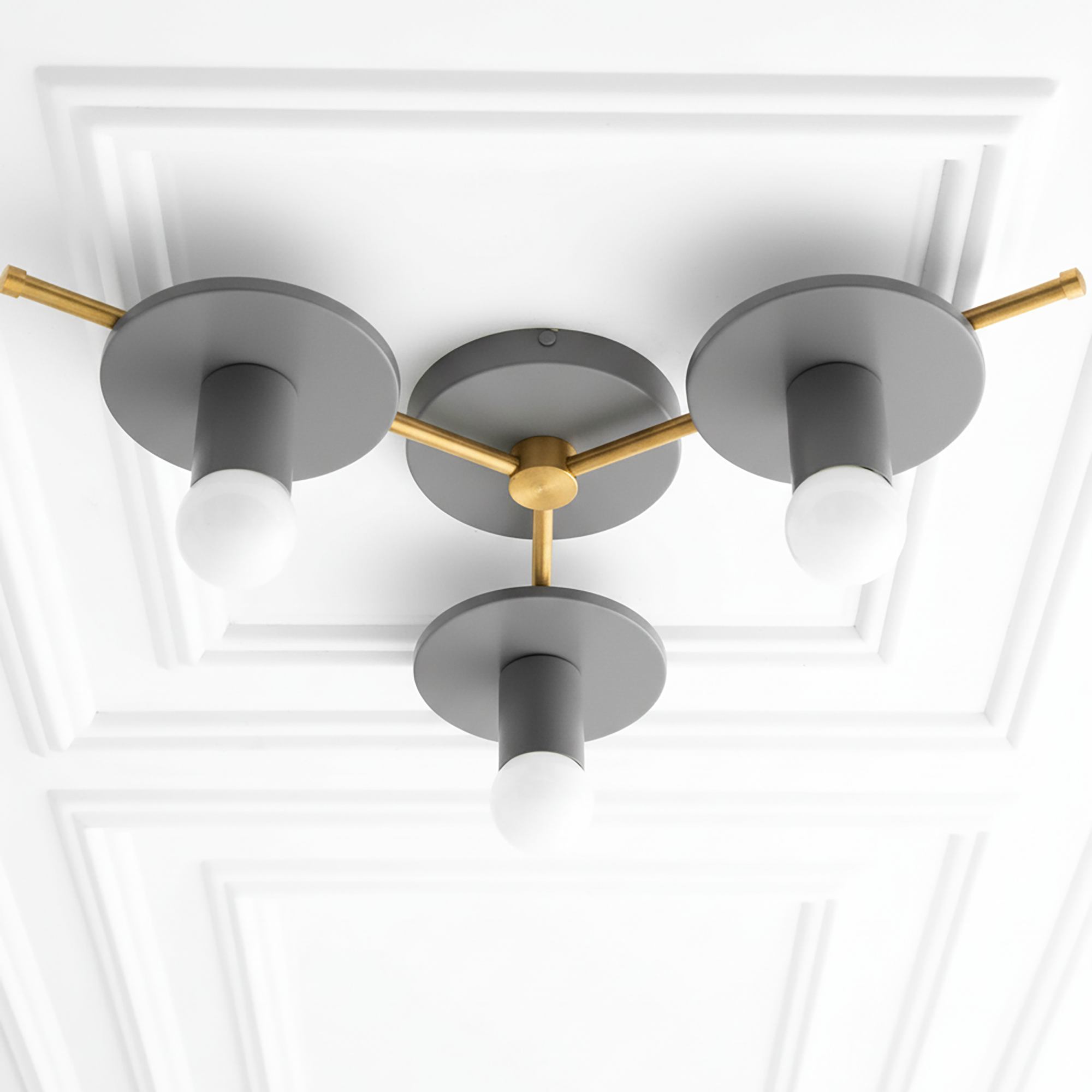 Mid-century modern flush mount chandelier with three bare white bulbs, matte gray and brass finish. - CHANDELIER MODEL NO. 9526