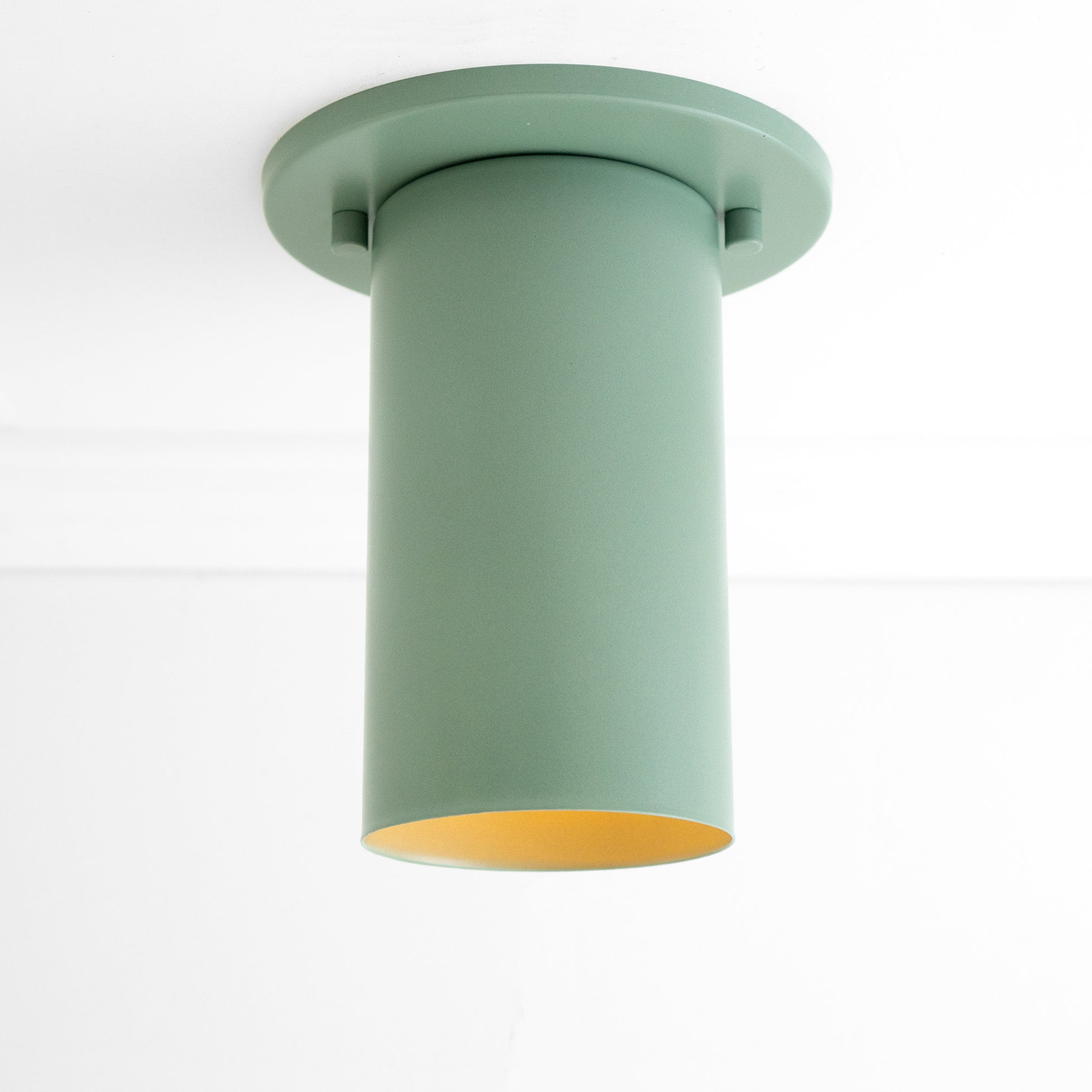 Matte sage green cylindrical flush mount ceiling light with recessed base and minimalist design. - CEILING LIGHT MODEL NO. 4771