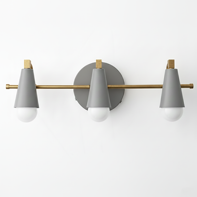Three-light vanity fixture with matte gray conical shades, brass horizontal bar, and round gray wall mount. - VANITY LIGHT MODEL NO. 8084