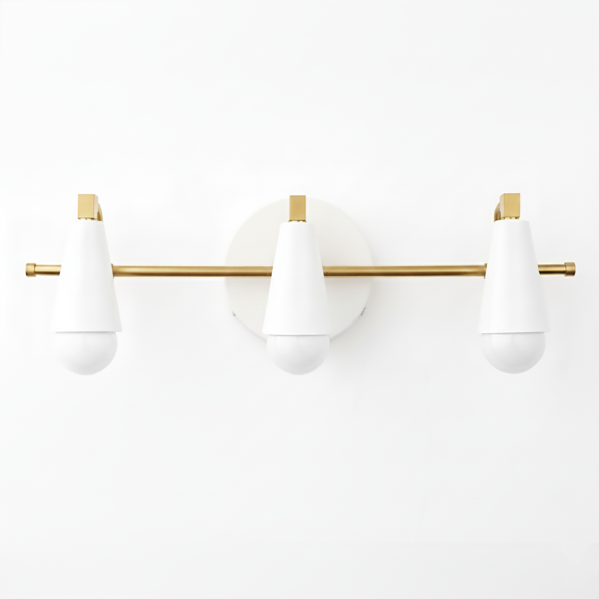 Three-light vanity fixture with white cone-shaped shades and a horizontal gold rod mounted on a round white base. - VANITY LIGHT MODEL NO. 8084