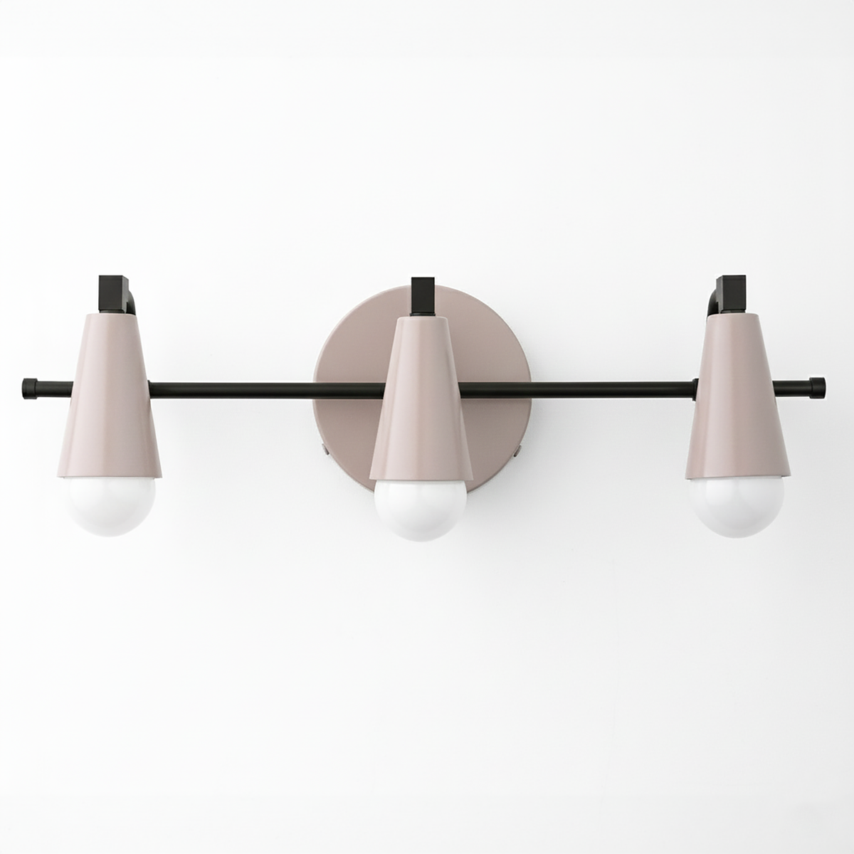 Mid-century modern three-bulb vanity light with matte pink cone shades and black metal rod. - VANITY LIGHT MODEL NO. 8084