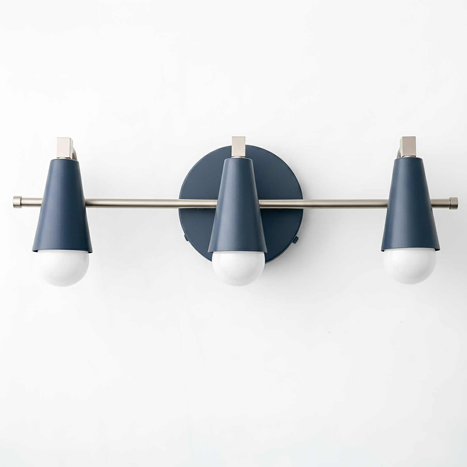 Mid-century modern vanity light with three blue cone-shaped shades and brushed metal rod mount. - VANITY LIGHT MODEL NO. 8084