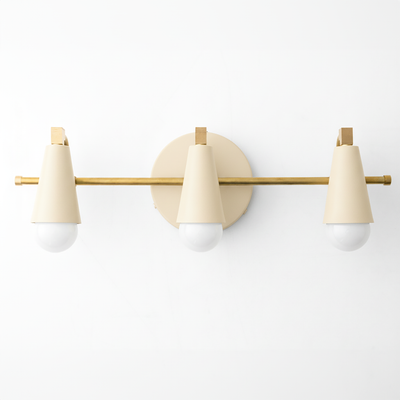 Mid-century modern vanity light with three cone-shaped cream shades and brass rod mounting. - VANITY LIGHT MODEL NO. 8084