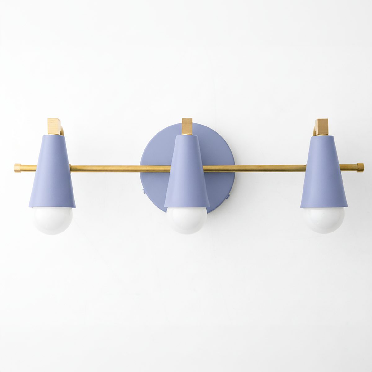 Three-light vanity fixture with matte lavender conical shades, brass accents, and round wall mount. - VANITY LIGHT MODEL NO. 8084