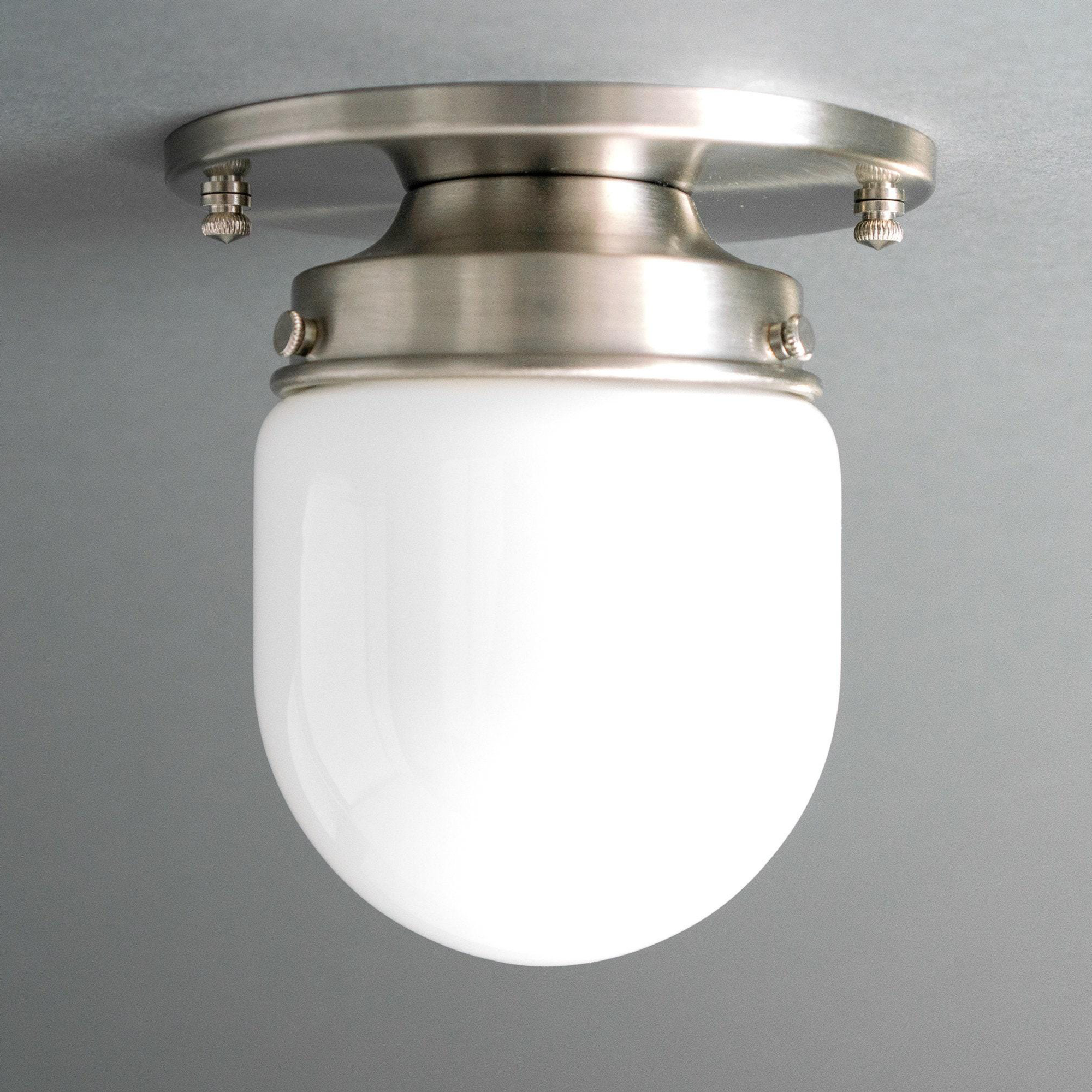 Flush mount ceiling light with brushed nickel finish and smooth white glass globe shade. - CEILING LIGHT MODEL NO. 9535