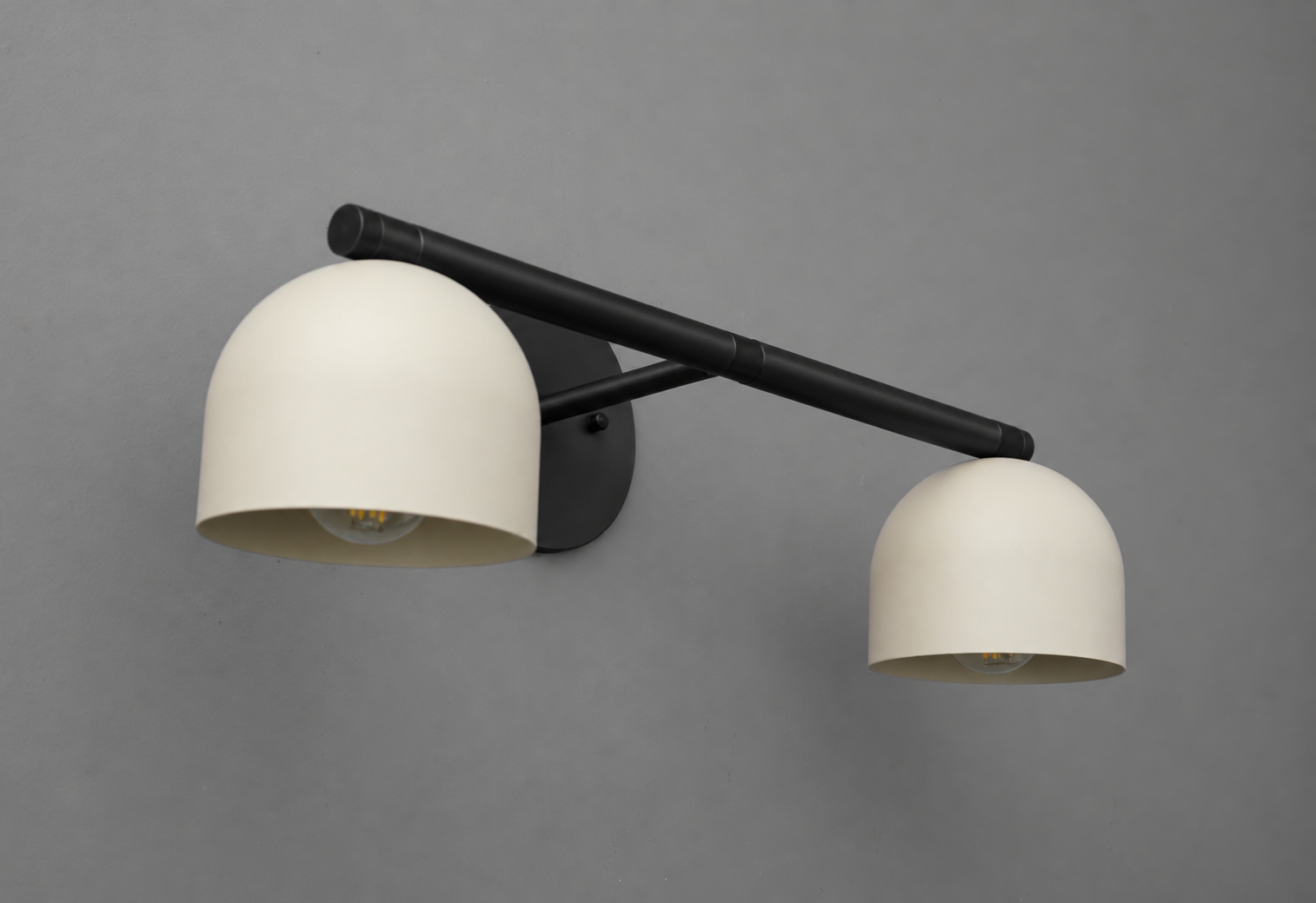Side angle of the vanity light in Black with Cream steel dome shades, showing the bulbs and the round wall plate. - VANITY LIGHT MODEL NO. 1186