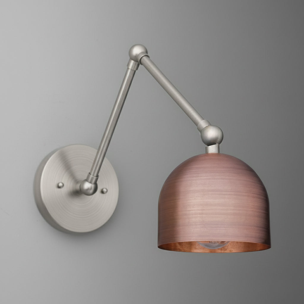 Brushed nickel wall sconce with adjustable arm and dome-shaped copper shade. - SCONCE MODEL NO. 5997