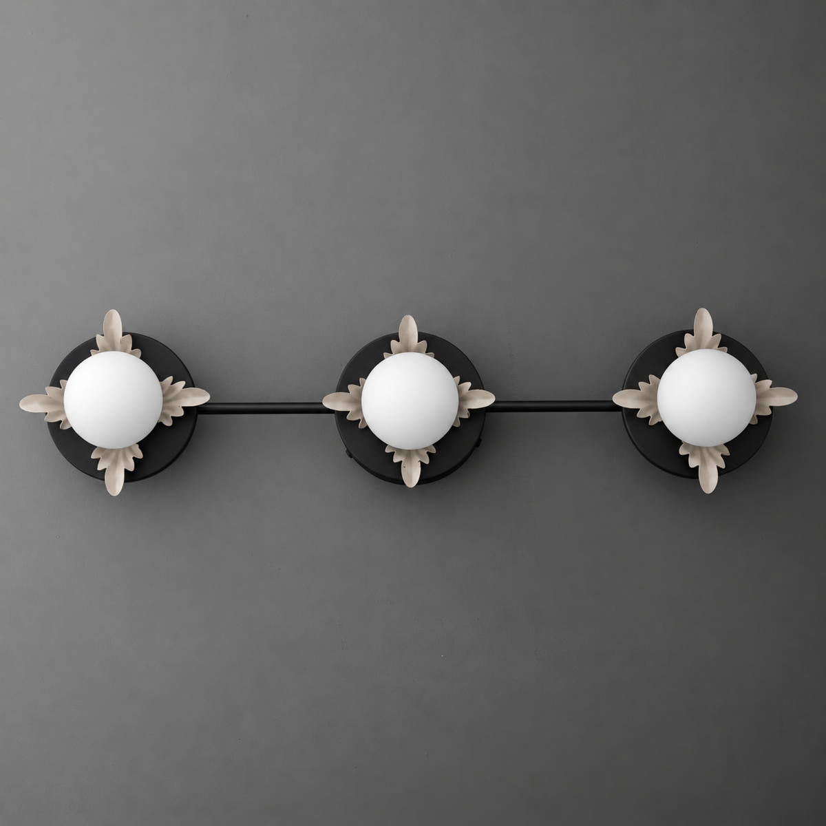 Black metal vanity light with three round frosted glass bulbs and decorative brass accents. - VANITY LIGHT MODEL NO. 1154