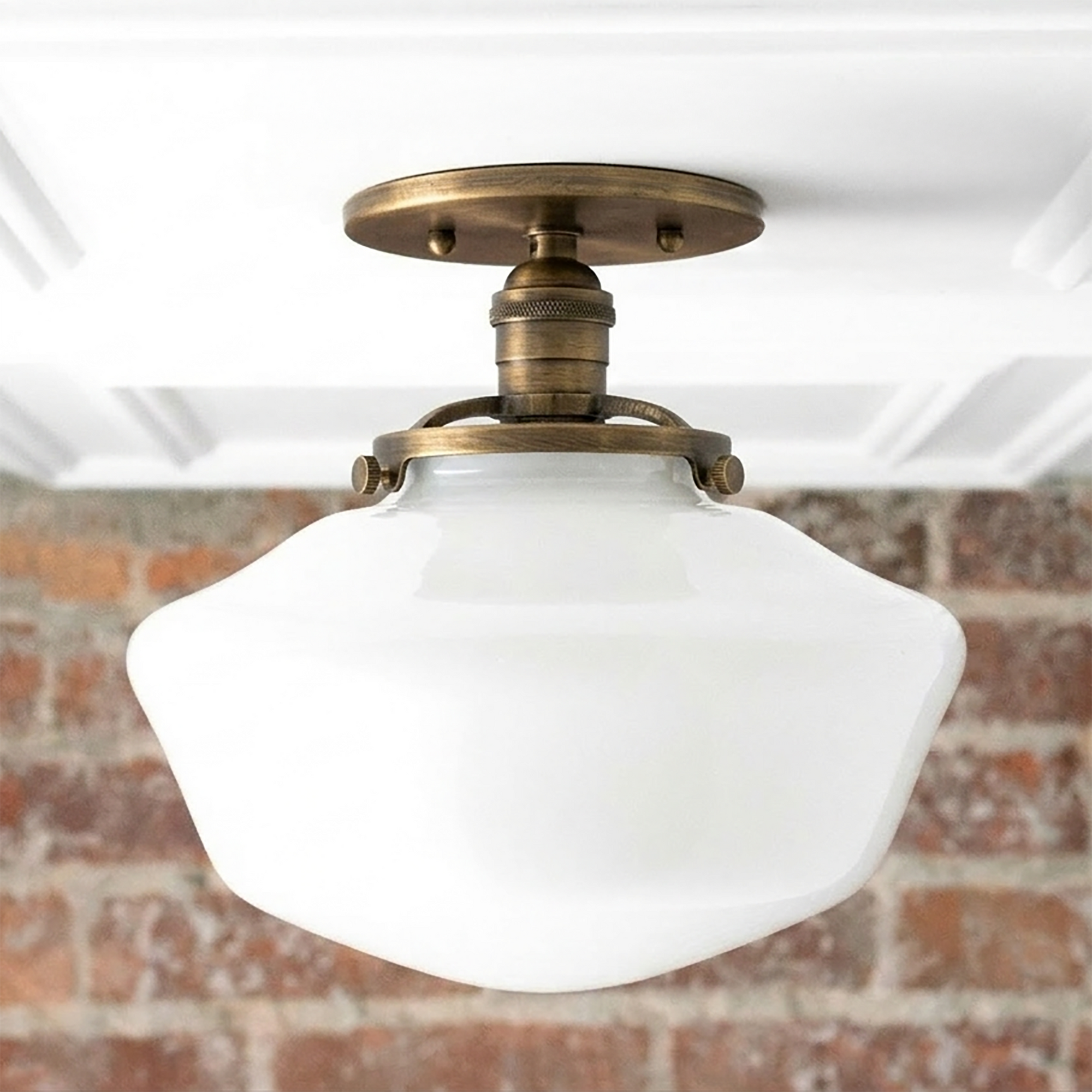 Mid-century semi-flush ceiling light with white glass globe and antique brass fixture. - CEILING LIGHT MODEL NO. 5754