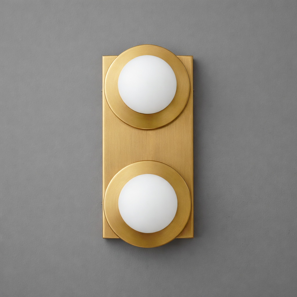 Two-light sconce in Sealed Brass with round plates and opal glass globes on a tall rectangular backplate. - SCONCE MODEL NO. 8828
