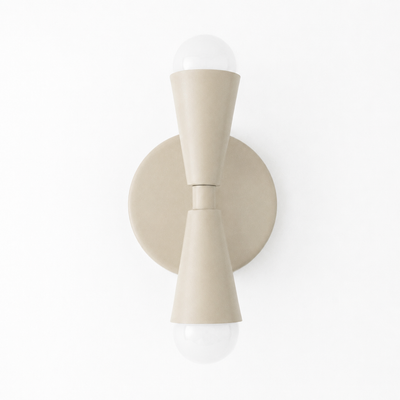 Beige matte metal Art Deco sconce with up/down white bulb sockets and round backplate. - SCONCE MODEL NO. 4717