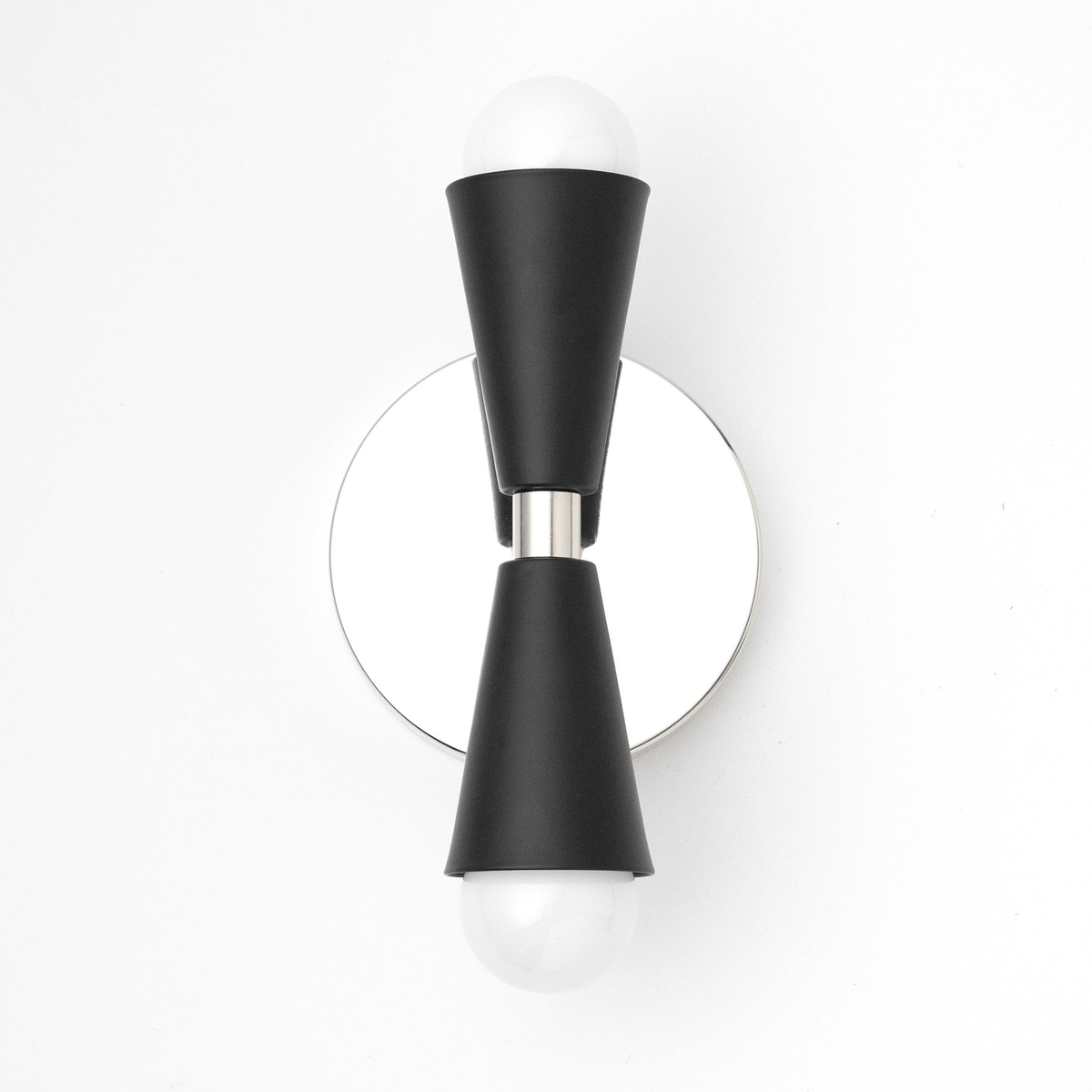 Black metal Art Deco sconce with hourglass shape, two exposed bulbs, and circular chrome backplate. - SCONCE MODEL NO. 4717
