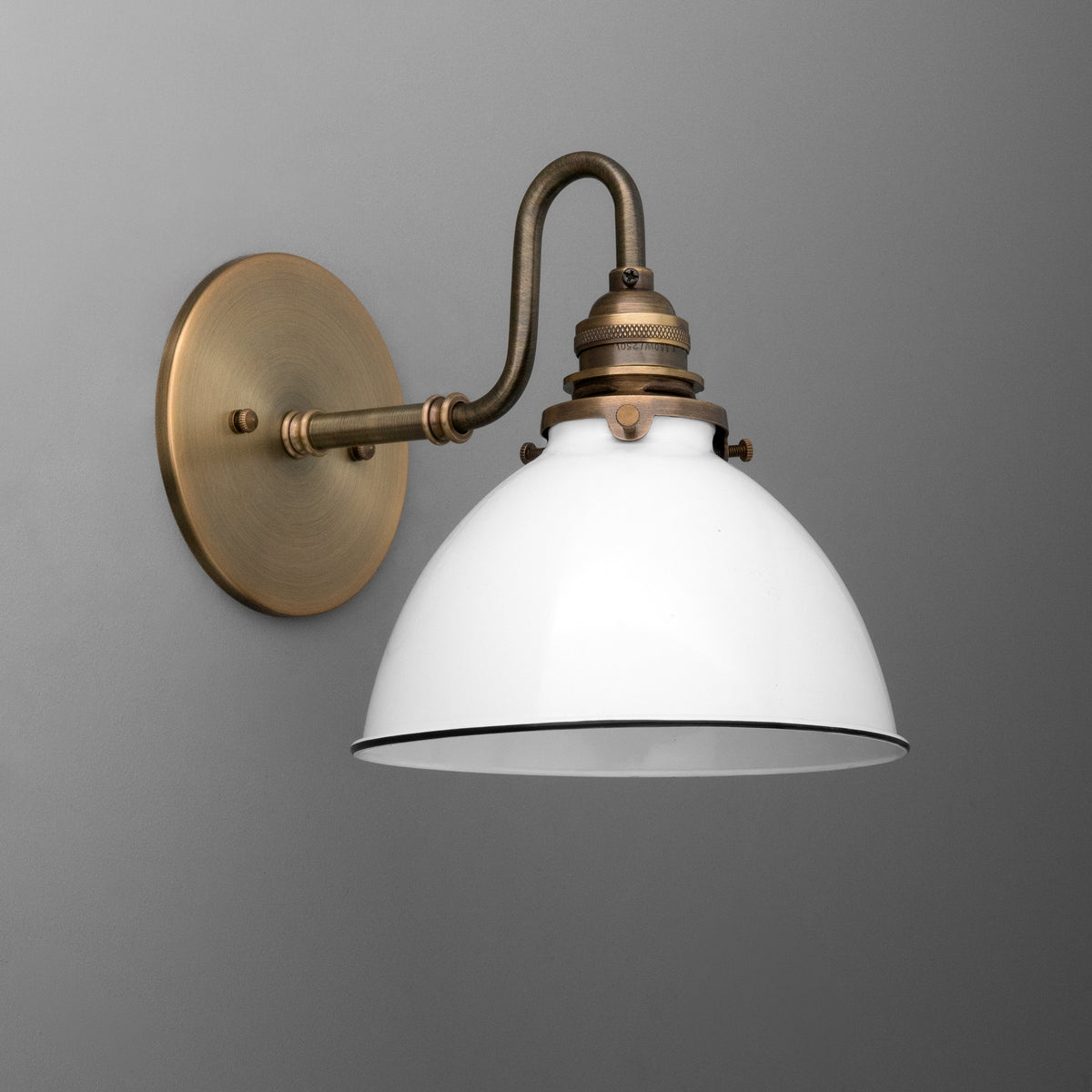 Wall-mounted sconce with antique brass finish and white dome-shaped metal shade. - SCONCE MODEL NO. 2587