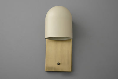 Antique brass wall sconce with cream domed shade and rectangular backplate. - SCONCE MODEL NO. 6029