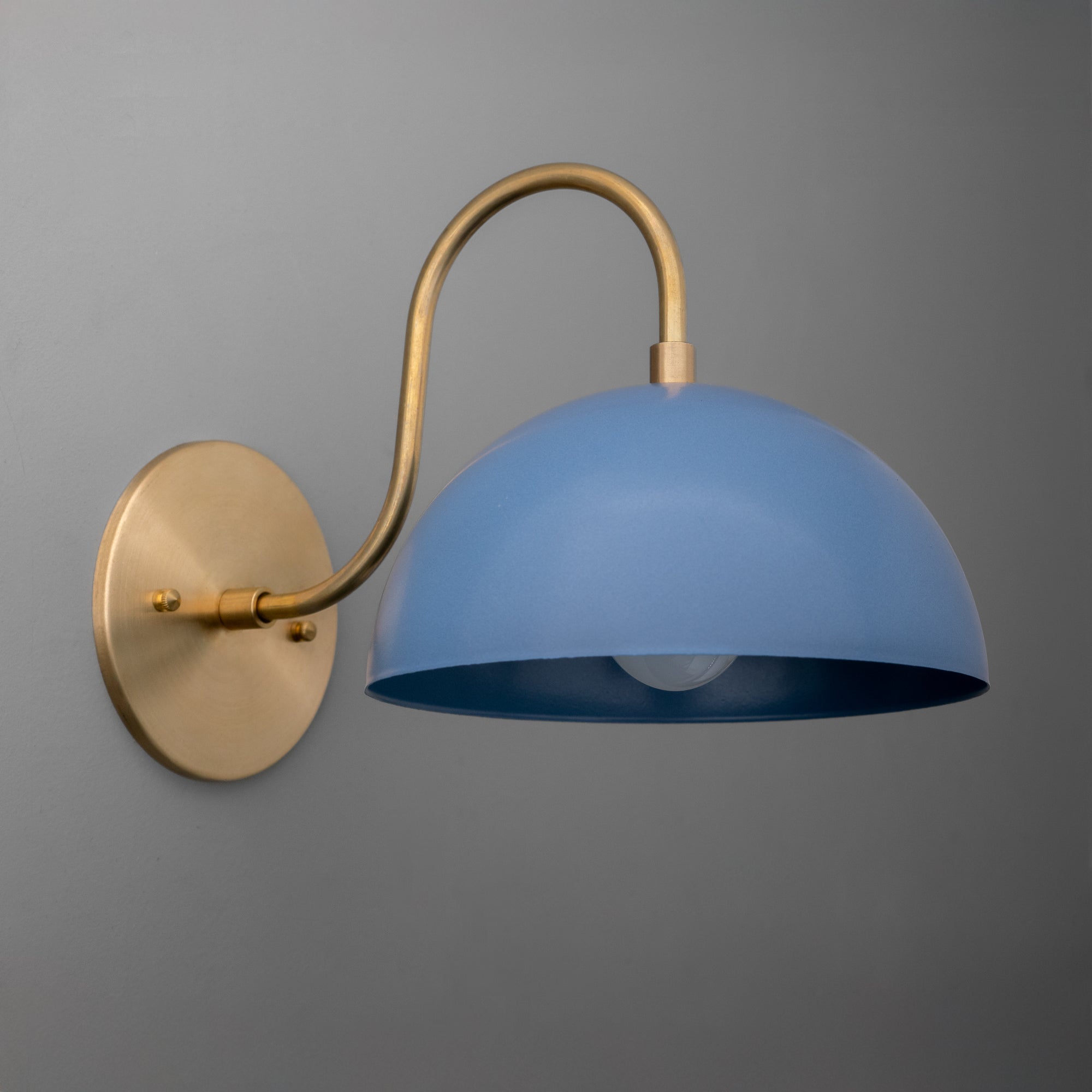 Wall sconce with matte blue dome shade and curved antique brass arm on round base. - SCONCE MODEL NO. 9092