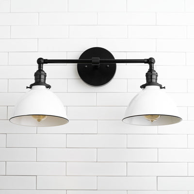 Industrial-style black metal vanity light with two white dome shades and exposed bulbs. - VANITY LIGHT MODEL NO. 4564